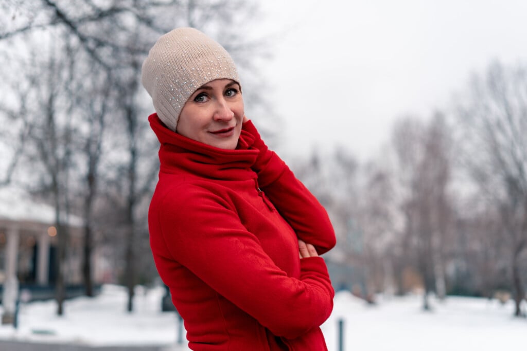 Beautiful Mature Woman In Red Bright Sportswear After Jogging And Running Outdoors With Park At Background. Active And Healthy Lifestyle At Middle Age