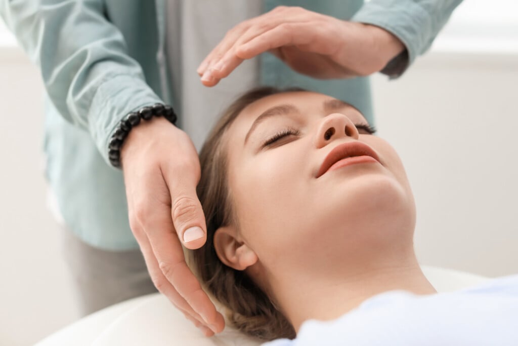 Reiki Master Working With Patient