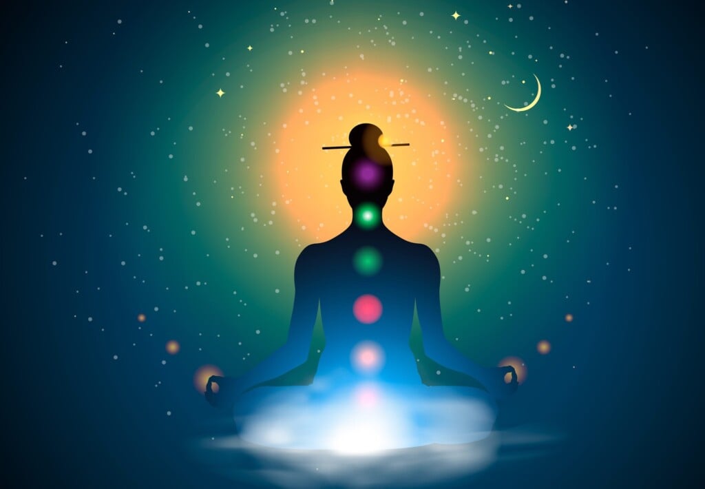 Meditating Silhouette Sitting In Lotus Position