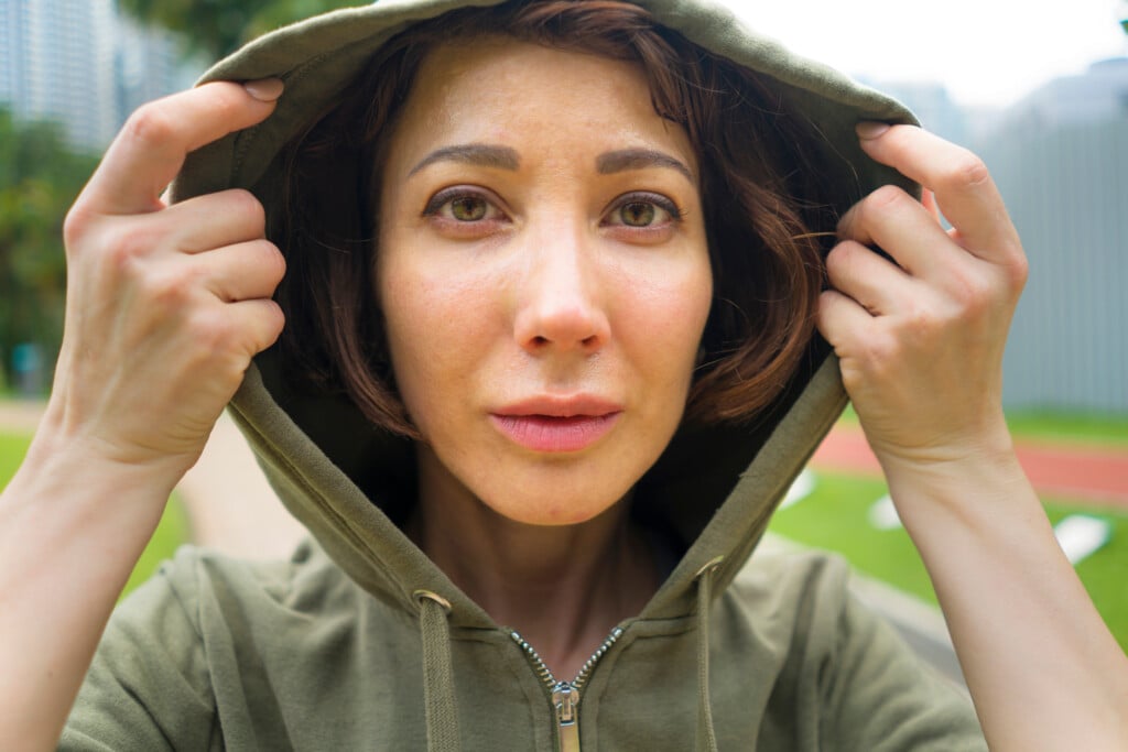 Young Attractive And Active Jogger Woman In Hoodie Top Ready For Morning Running Workout At Beautiful City Park In Fitness Sport Training And Healthy Lifestyle Concept