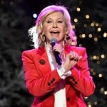 Olivia Newton John Performs Before The 85th Annual Hollywood Christmas Parade In Los Angeles