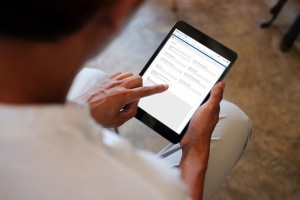 Guy Using Tablet Blurred More March30 1536x1024