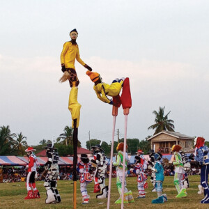 Stilt Walkers In Dress Carnival in Ghana