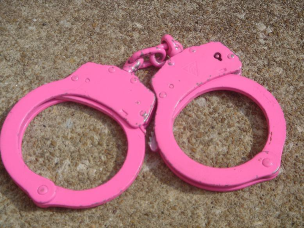 The KCPD uses pink handcuffs