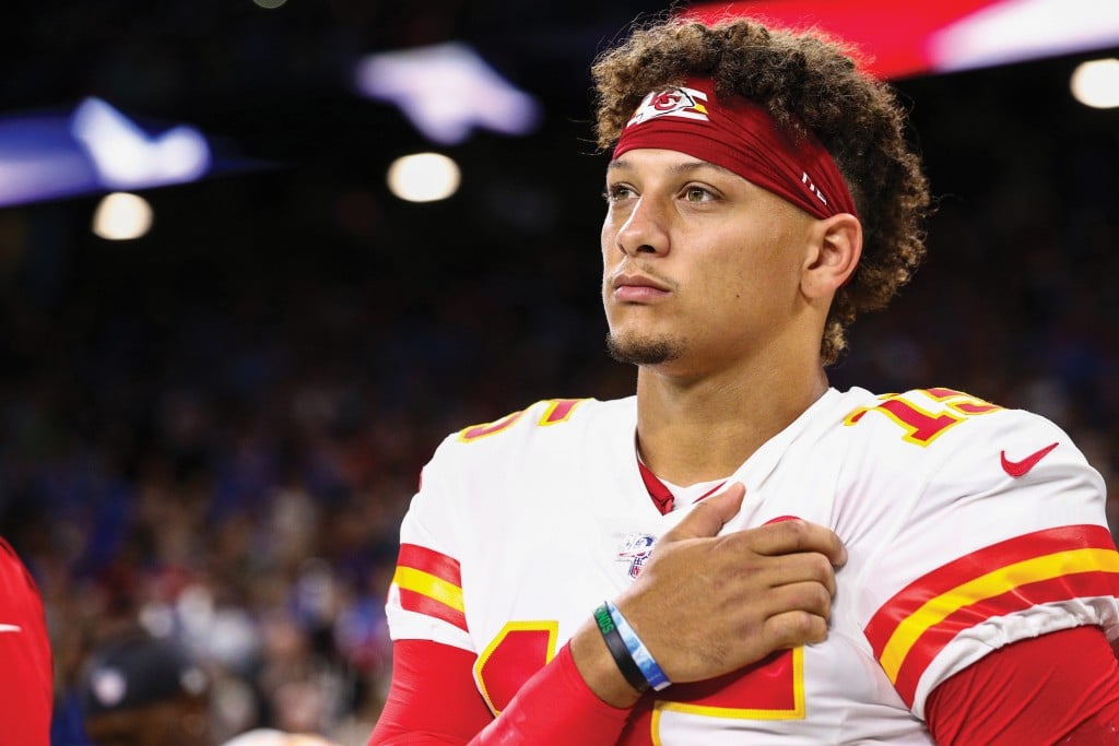 Patrick Mahomes puts right hand on chest during National Anthem played before a Chiefs game on September 29, 2019.