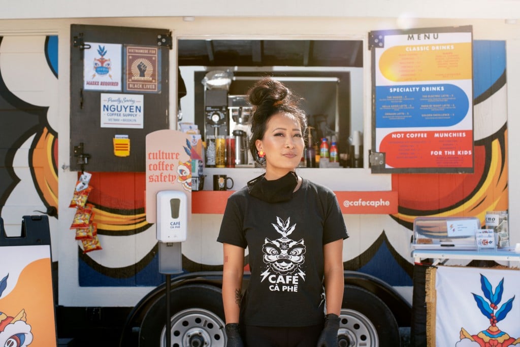 Jackie Nguyen Of Cà Phê stands in front of their coffee truck