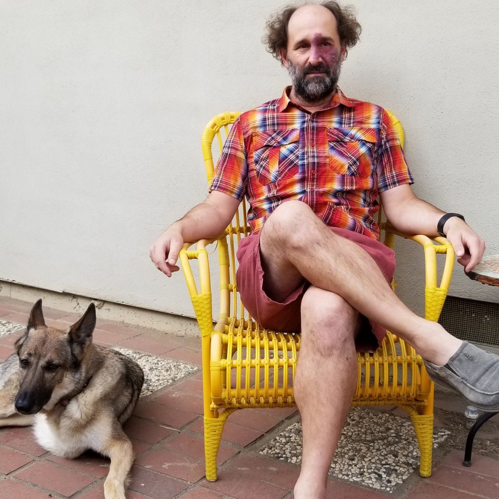 Press Photo Sitting With Dog V3 Photo By Amy Bee