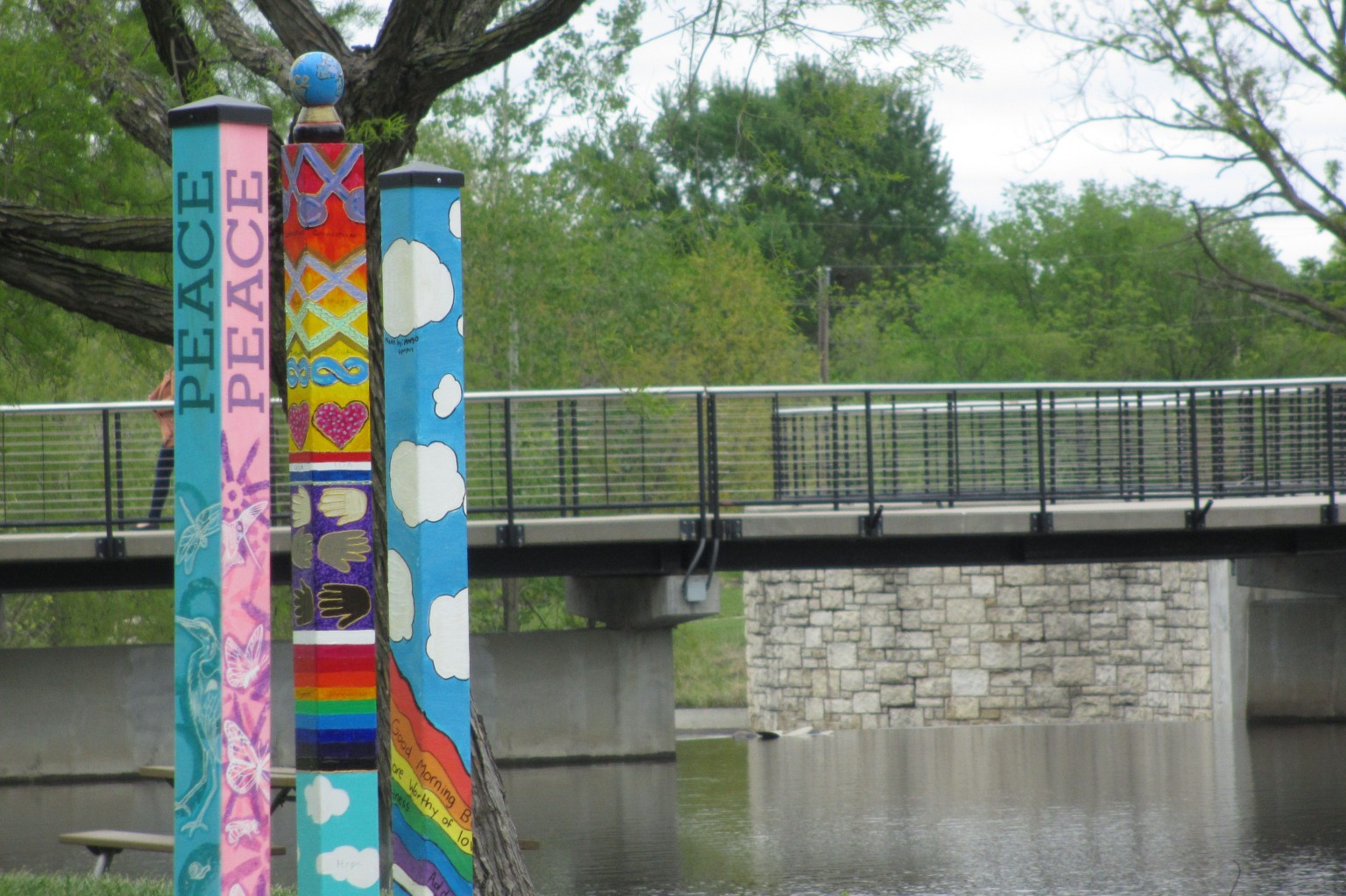 Peace Poles project decorates SarKoPar Trails Park with a community art installation