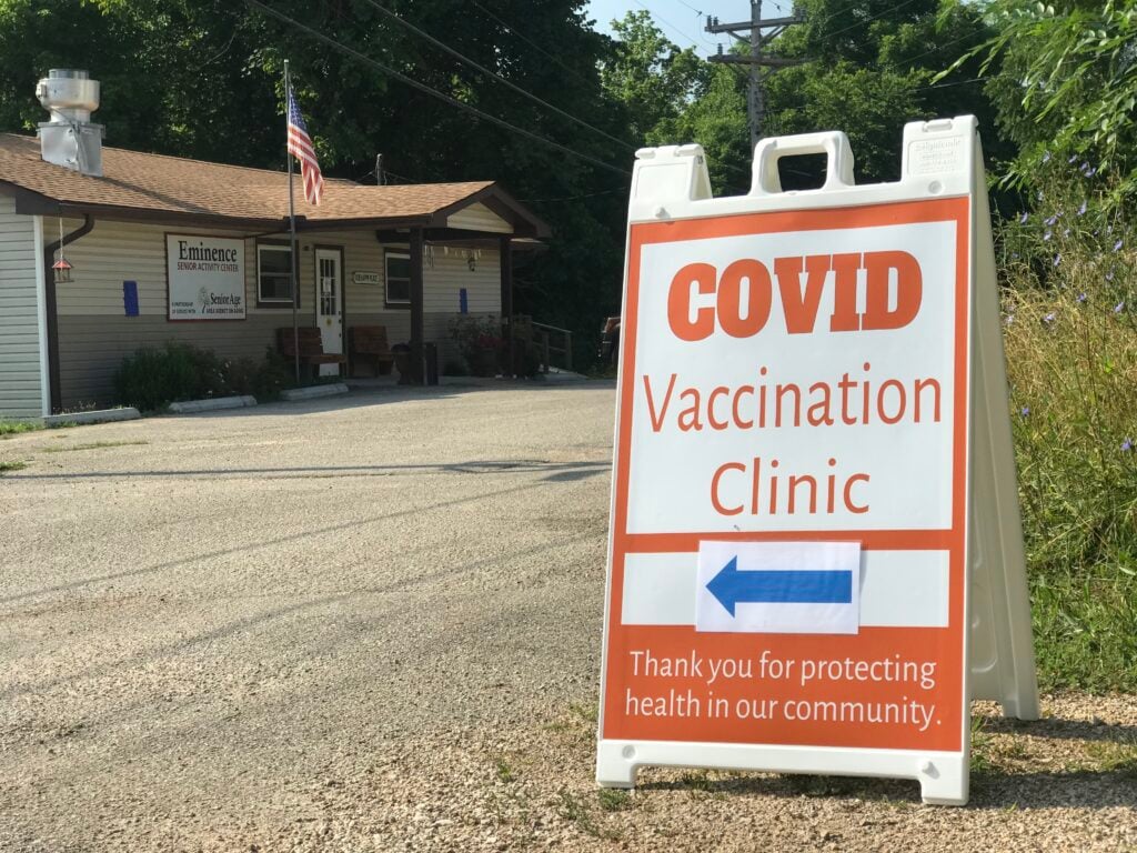 A sign marks the entrance to the a drive-through COVID-19 vaccine clinic at the Shannon County Health Center on July 8, 2021. // Photo by Tessa Weinberg/Missouri Independent