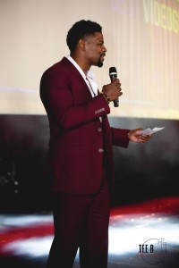 Best Male Fitness Trainer finalist Craig Donnel presenting the Best Videographer & Photographer award. // Photo by H. Ervin Photography