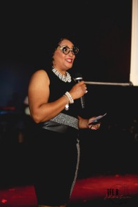 Winner for Best Community Organization, Jessica McCallop with Giving Help & Hope, presenting the Best Realtor award. // Photo by H. Ervin Photography