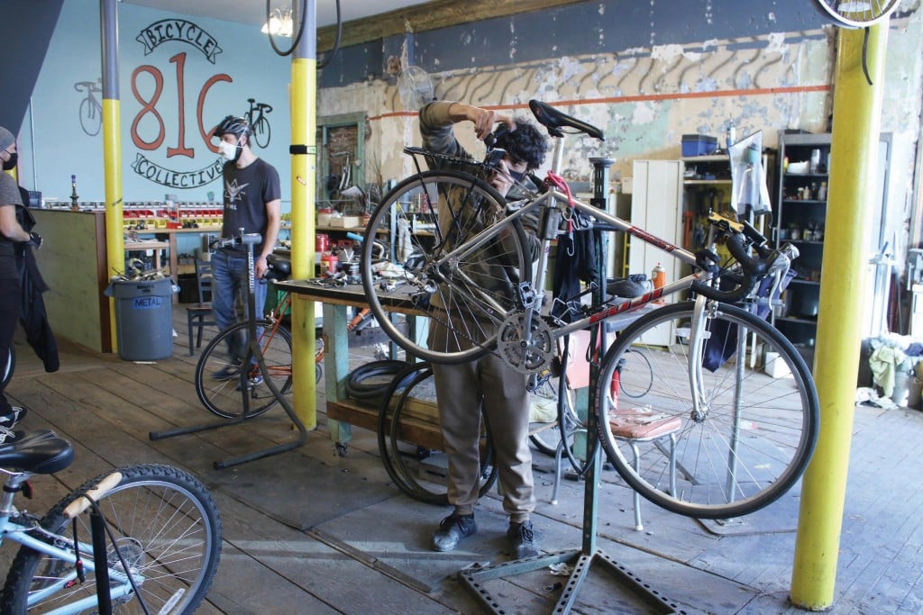 Stefano Merced, 17, Works On His Bike At The 816 Bicycle Collective.