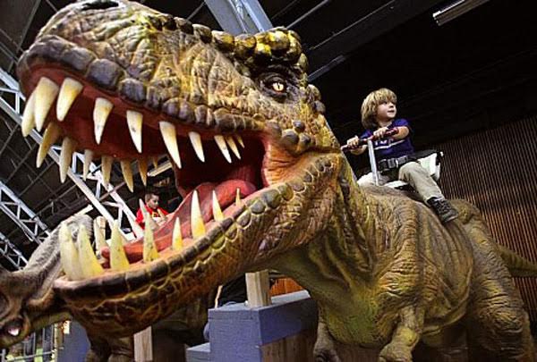 Kid Riding T Rex 1
