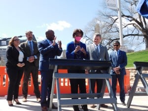 Nuria Fernandez, FTA administrator, was the first to sign the streetcar tract. // Photo by Savannah Hawley