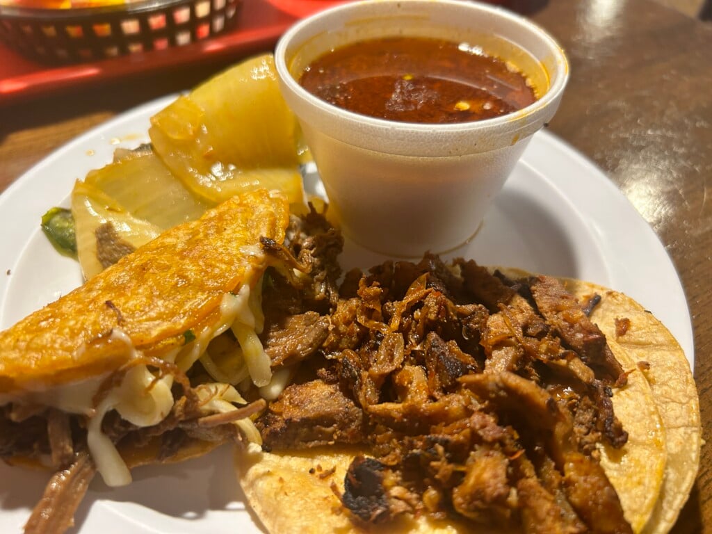 Quesabirria And Al Pastor Taco With Consome At Taqueria La Nueva