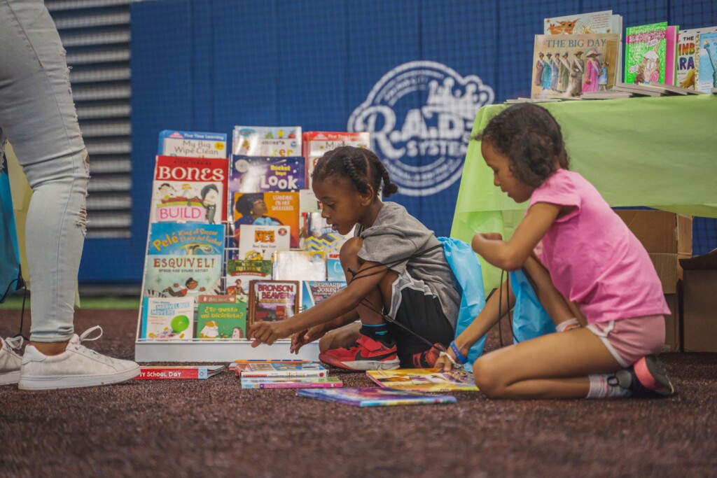 Girls Looking At Books