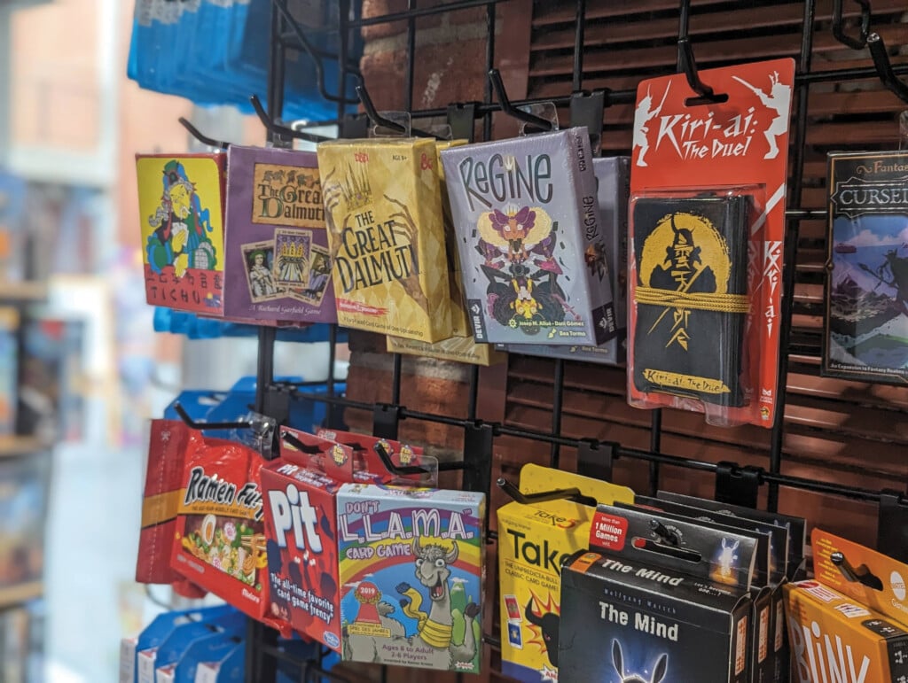 Image Of The Kiriai Hanging Next To Other Games At The Shop