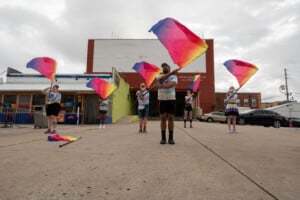 The Color Guard Practices In Formation Before The Start Of The Parade.