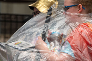 Clarinetist Maryn Dons A Poncho In Preparation For A Rainy Performance.