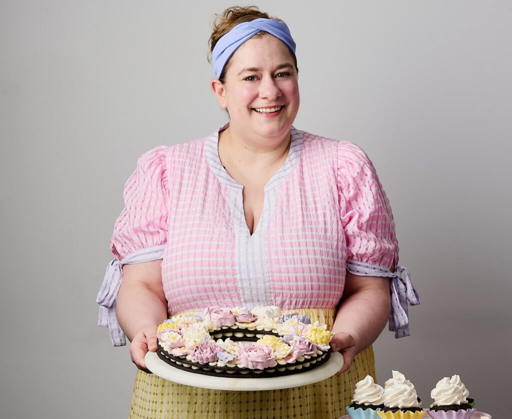 Erin Jeanne McDowell posing with pastries.