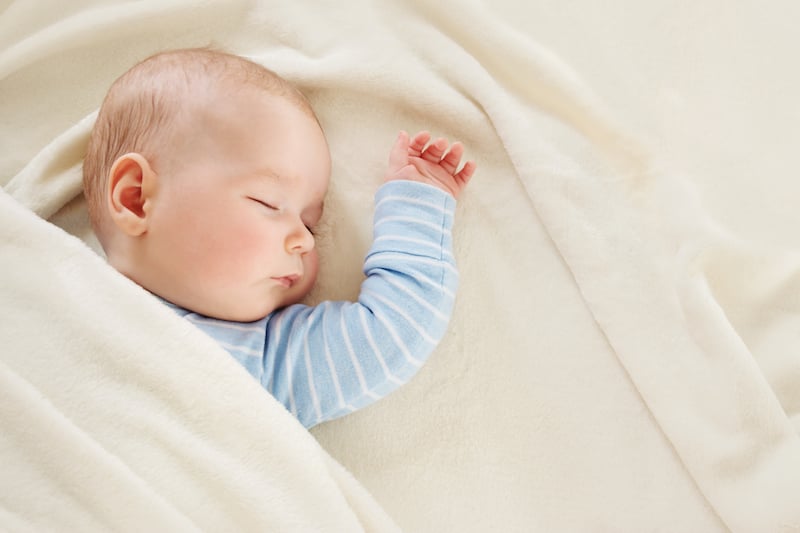 sleeping infant. co-sleeping concept
