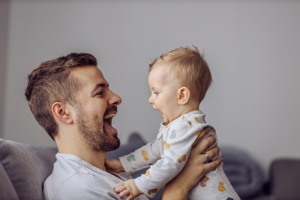 dad talking to his baby