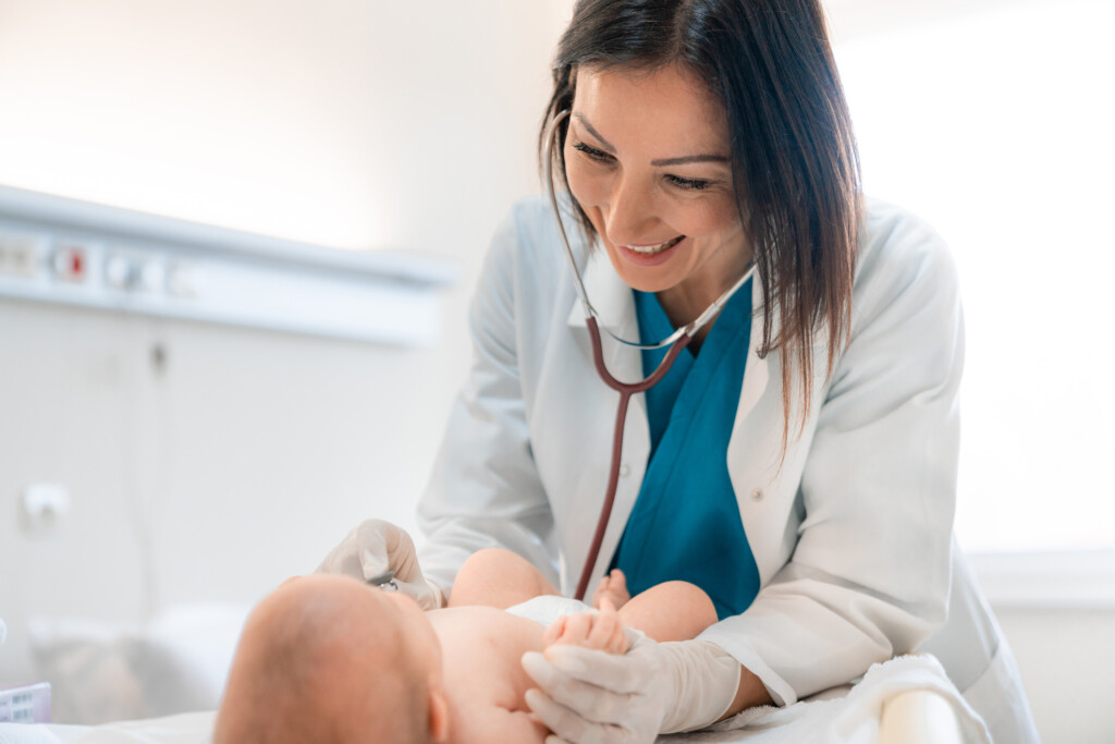 a pediatrician and a young baby
