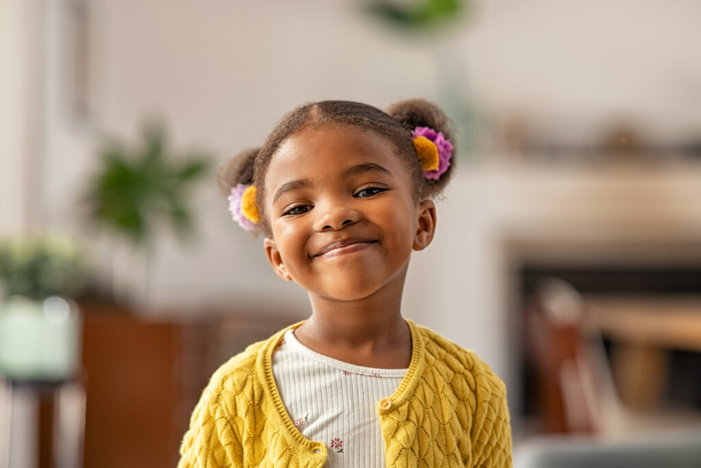 young girl smiling at camera