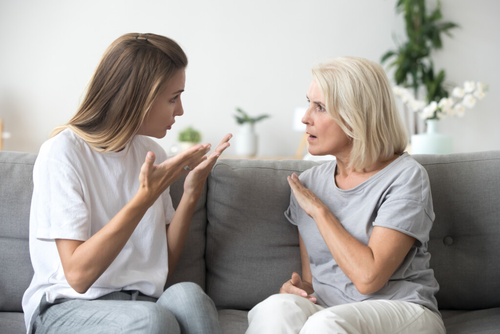 younger woman and older woman arguing