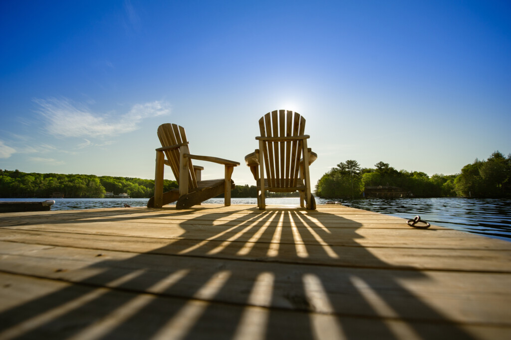 two empty adirondack chairs, for article on advice for empty nesters