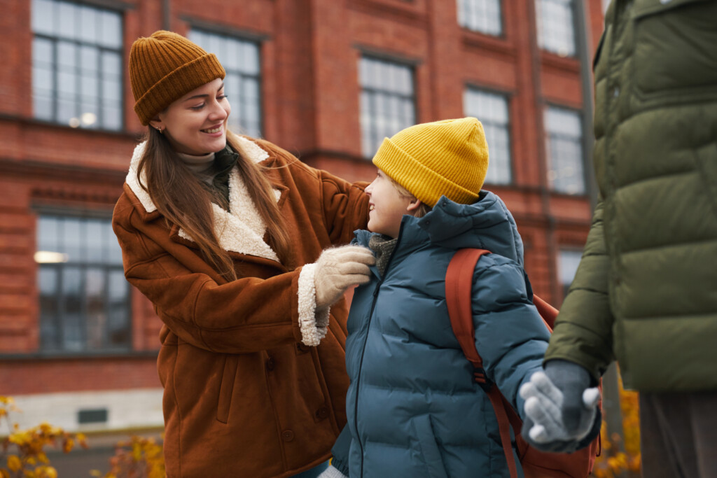 parents ready for school drop-off with child
