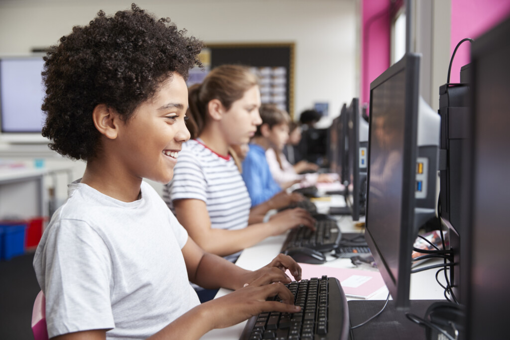 students working at computers, possibly coding