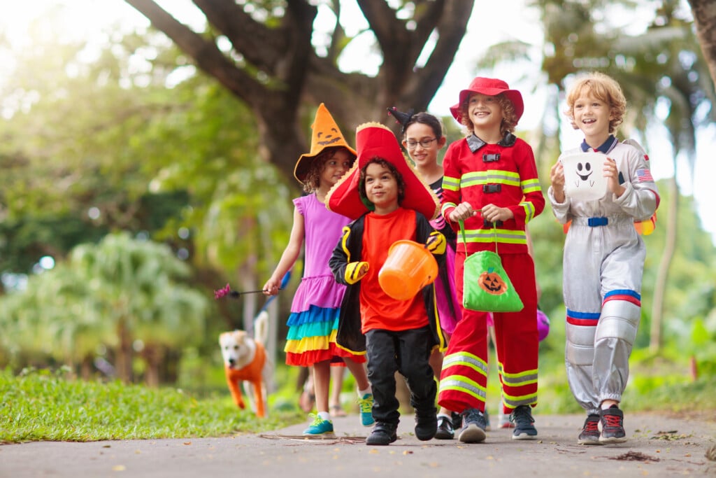 a group of kids trick or treating