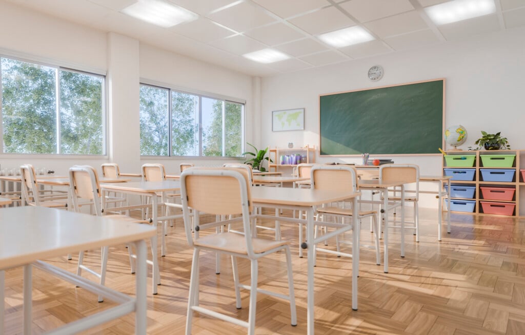 Empty Classroom With Desks And Chairs