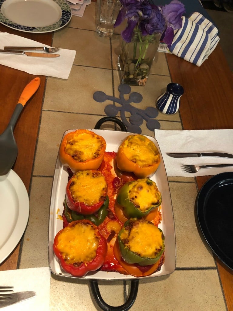 a tray of stuffed peppers, recipe found in article