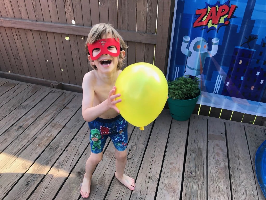 joss rittler holds a balloon for an article on things to do with balloons