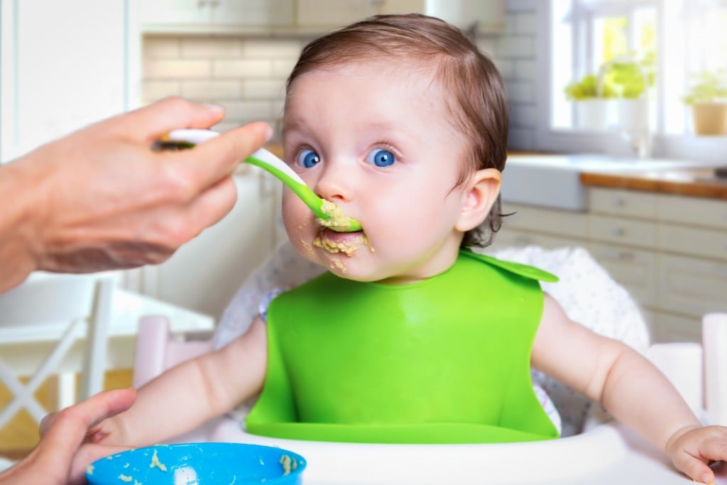 Baby Girl Is Surprised About The First Time Feeding With Solid Foods