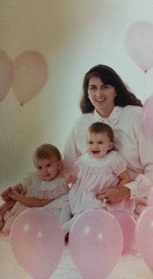 breast vs. bottle? diane morrow kondos sits with her two children, one was breastfed and the other bottlefed
