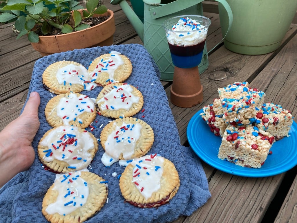 three fourth of july treats - homemade pop tarts; red, white and blue layered jello; rice krispies treats