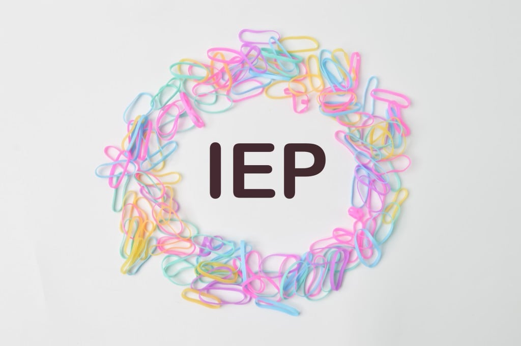 the letters IEP surrounded by colorful rubber bands