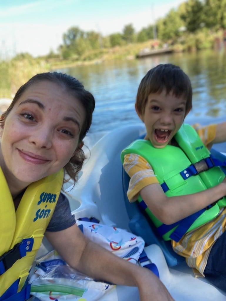 tara rittler and her son joss boating at gathering place