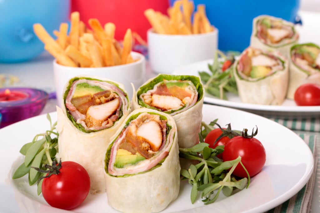 Chicken tortilla wraps on a plate for a party