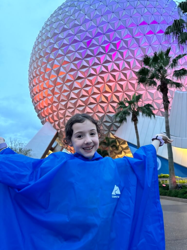 Isabelle in front of Spaceship Earth at Epcog