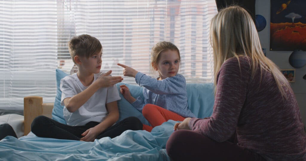 Mother Talking With Bickering Siblings, for article on sibling rivalry