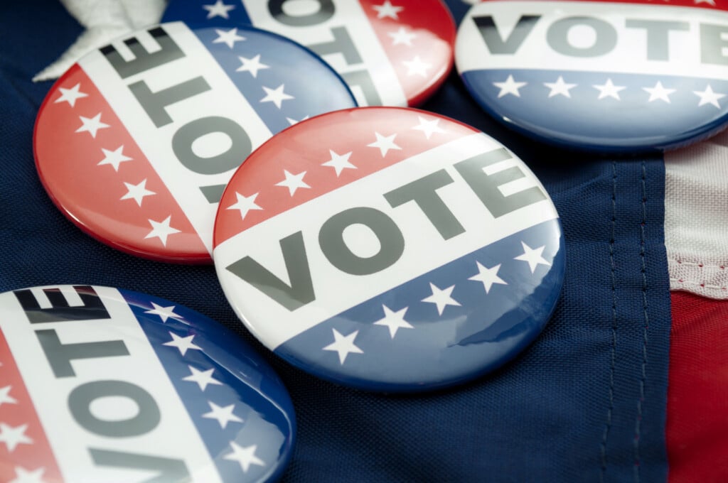 Red, white and blue buttons that say "Vote"
