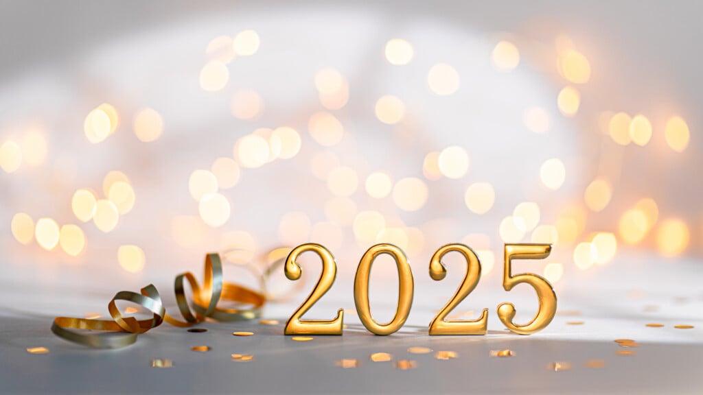 2025 with blurred confetti background