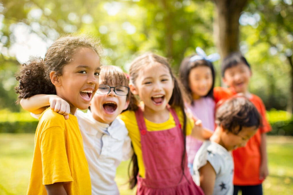 school-age kids having fun at summer camp
