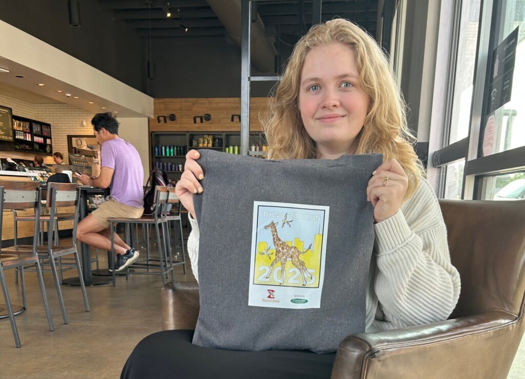 Jocelyn Doeksen holds a Tulsa ZooRun tote