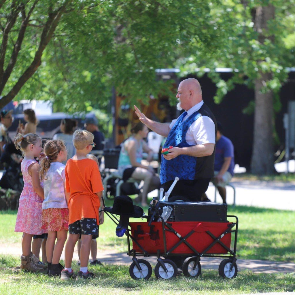 children and an entertainer at the woolaroc Kidsfest