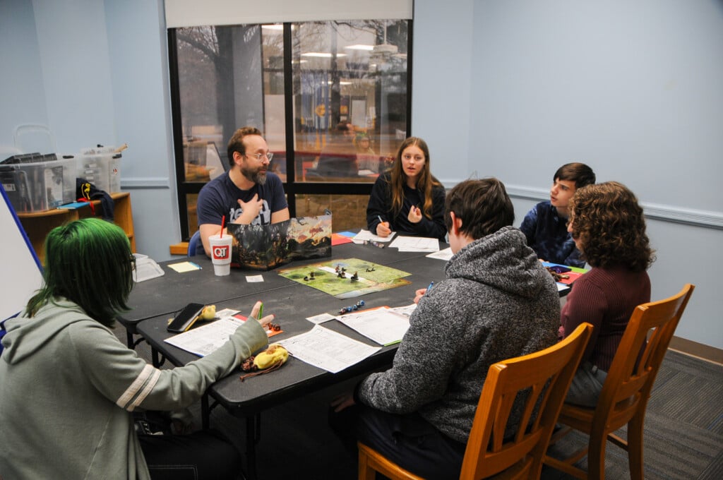 a group of teens playing DnD at a tulsa city-county library branch